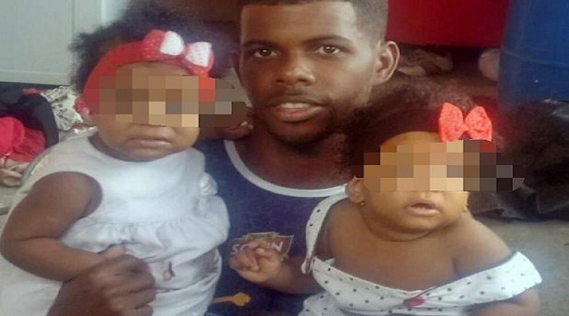 Ueliton com as filhas gêmeas, pouco tempo antes do acidente (Foto: Arquivo da família)